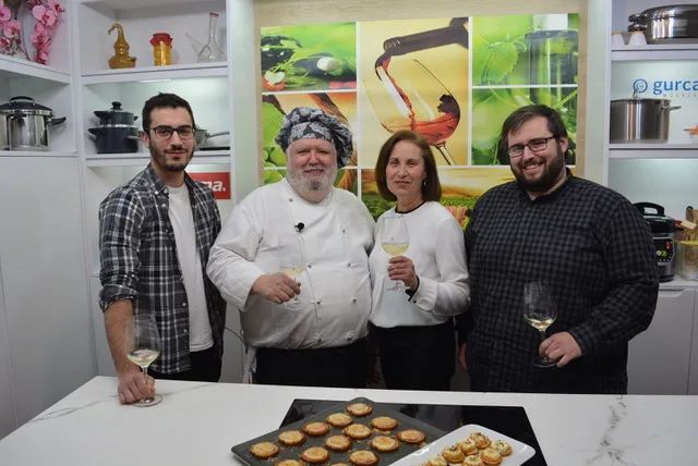 Spanish chef Javier Romero and his Cocina Familiar team celebrating in their TV studio